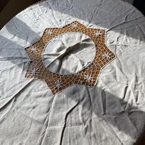 Antique wheat linen and crochet tablecloth